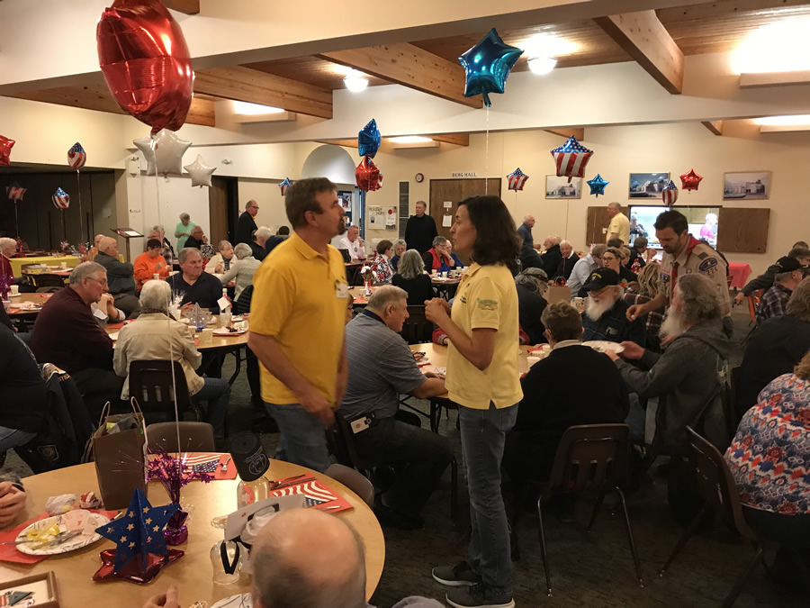 Volunteers provide a Veterans Dinner every November
